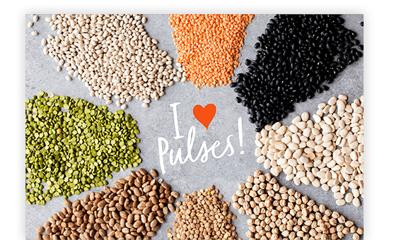Piles of pulses surrounding 'I Love Pulses' text